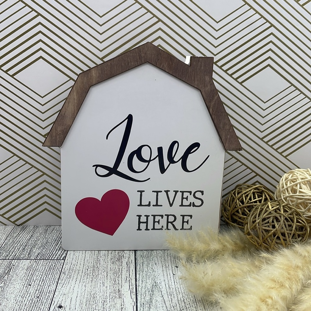 Wooden house love lives here.